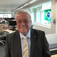 Graham Moore  MBE MSc FICPD. D Univ