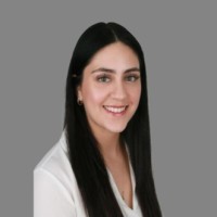 Paula Delgado, Acom