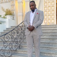 Eric J White