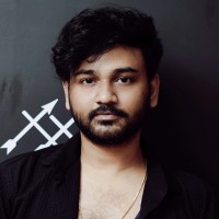 Charan T