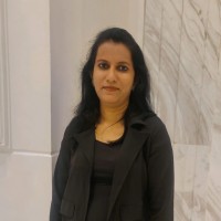 Rashmi M