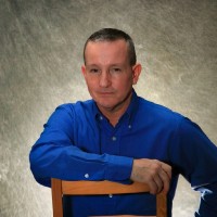 Kevin J Miller