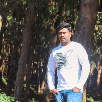 Naveen K S