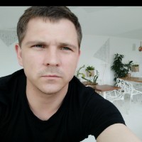 Александр Романюта