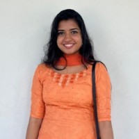 Nisha B