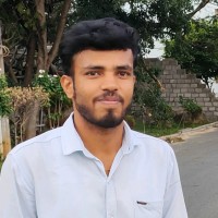 Vasu B