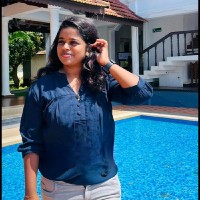 Amitha M