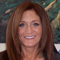 Debra E.