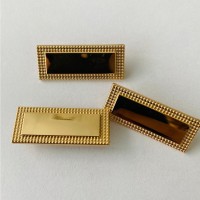 Dora Fabrica botones metálicos