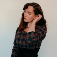 Adeline M.