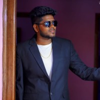 Ajay B