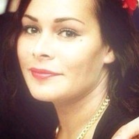 Janelle M.