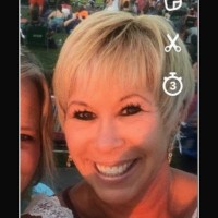 TAMI L. POGUE