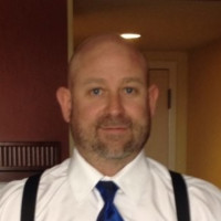Travis R.
