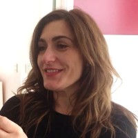 Maria Carolina Laino (She/Her)