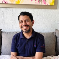 CARLOS E. TORRES