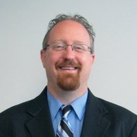 Tim Holland, Pe