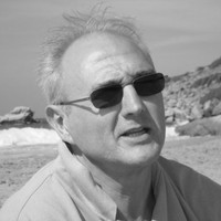 CARLOS B.
