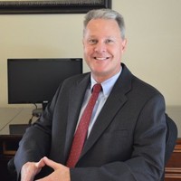 Michael E Knapp