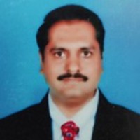 Dr Dinesha L