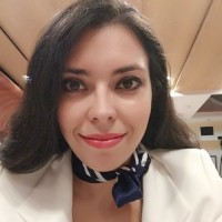 Lucia E.