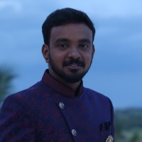 Vignesh E