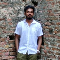 Dinesh T