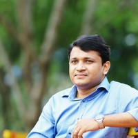 Dr Kevin John