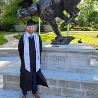 Adam Moore, Mba