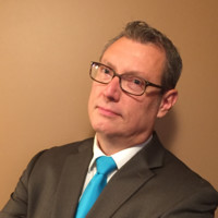John M. Rogus