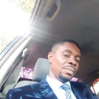 Madu Godwin A Sam. B.sc, Dip Theo, B.A, M SC, P hd