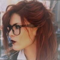 Laura E.