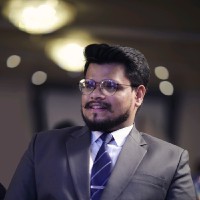 Meshak J.