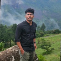 Athul E
