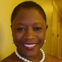 Tanya E. Foster, Mba