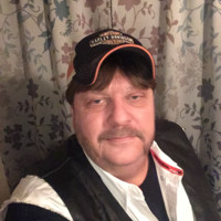 Norman. “Buster” Stine