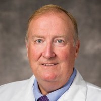 Eric J Devaney