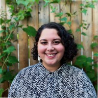 Elaine Román (They/Them)