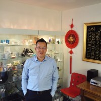 Tim (Xiaoming) Tang