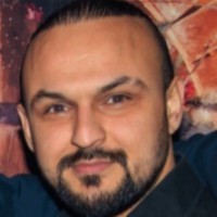 Tolga Oz