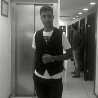 E. TARIK ÖZUĞURLU