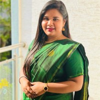 Brinda M
