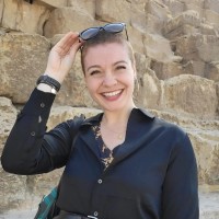 Julia Buhagiar,  CPCM, RYT, YACEP