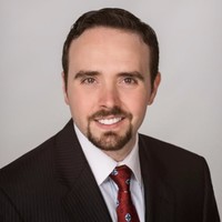 Daniel J Brassil