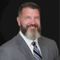 E. John Roach
