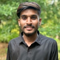 Suman B .