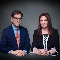 The Andrew And Amelia Team .