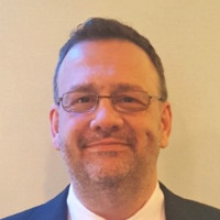 Robert J Knezic