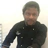 Mbaku Check Aloysius
