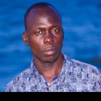 ROBERT AKOMO
